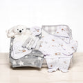 Twinkle Twinkle baby gift with a white plush bear, a star print blanket, a sleepsuit and mittens