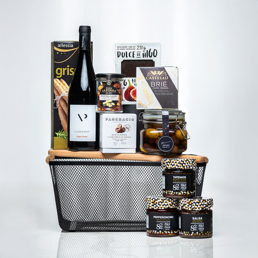 Artisan Collection medium wire basket with wine, brie, preserves, olives and a serving board