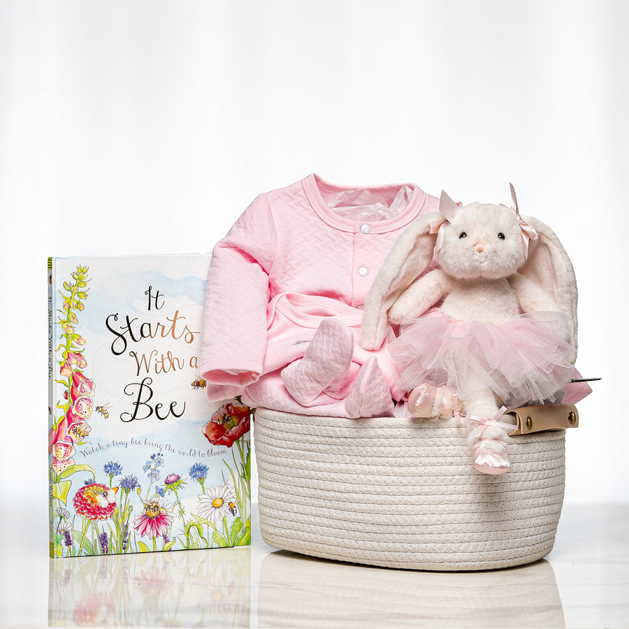Ballerina Bunny baby girl gift with a pink outfit and a ballerina plush bunny in a woven basket