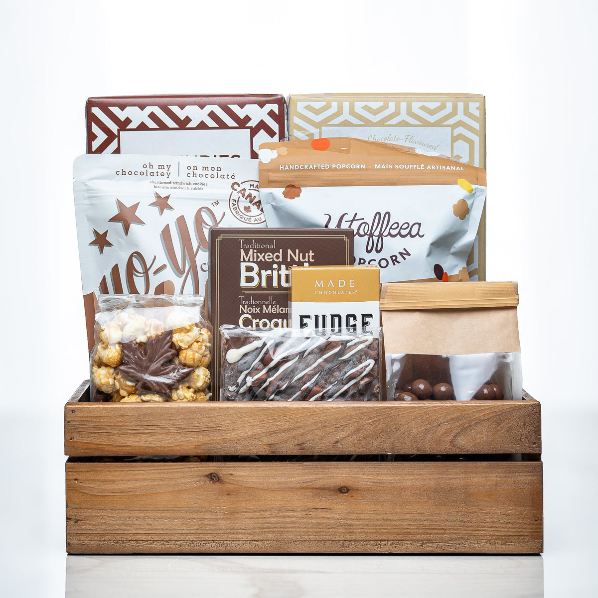 Canadian Cravings medium wooden crate with mixed nut brittle, fudge, popcorn and maple treats