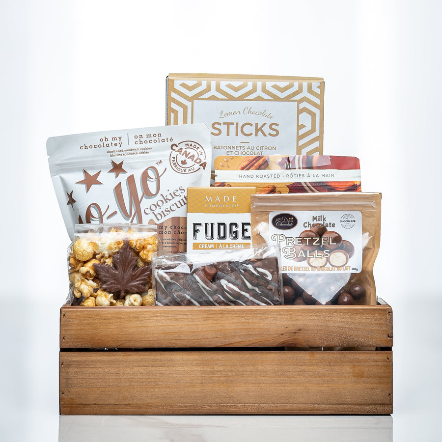 Canadian Cravings small wooden crate with maple sticks, fudge, popcorn and Canadian treats