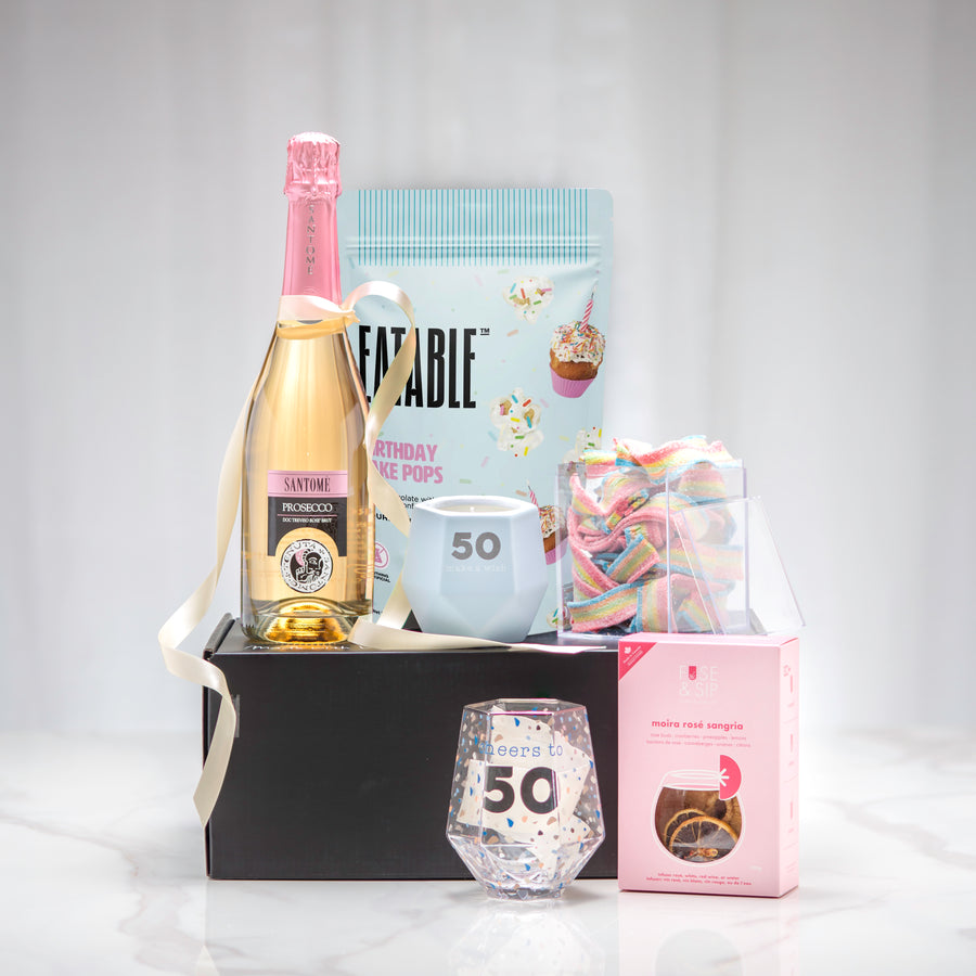Cheers to You 50th birthday gift set with sparkling wine, a 50 stemless glass and cookie pops