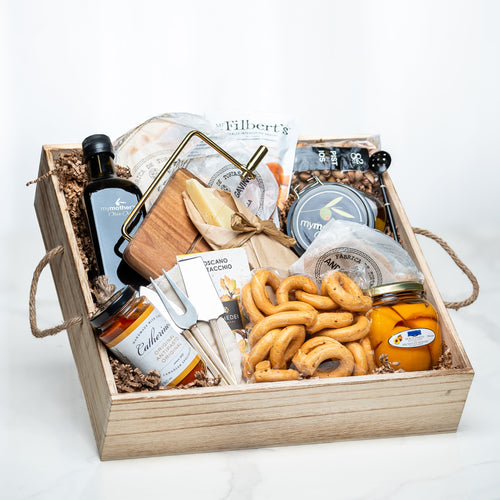 Cheese Connoisseur wooden crate with cheeses, charcuterie, crackers, taralli and preserves