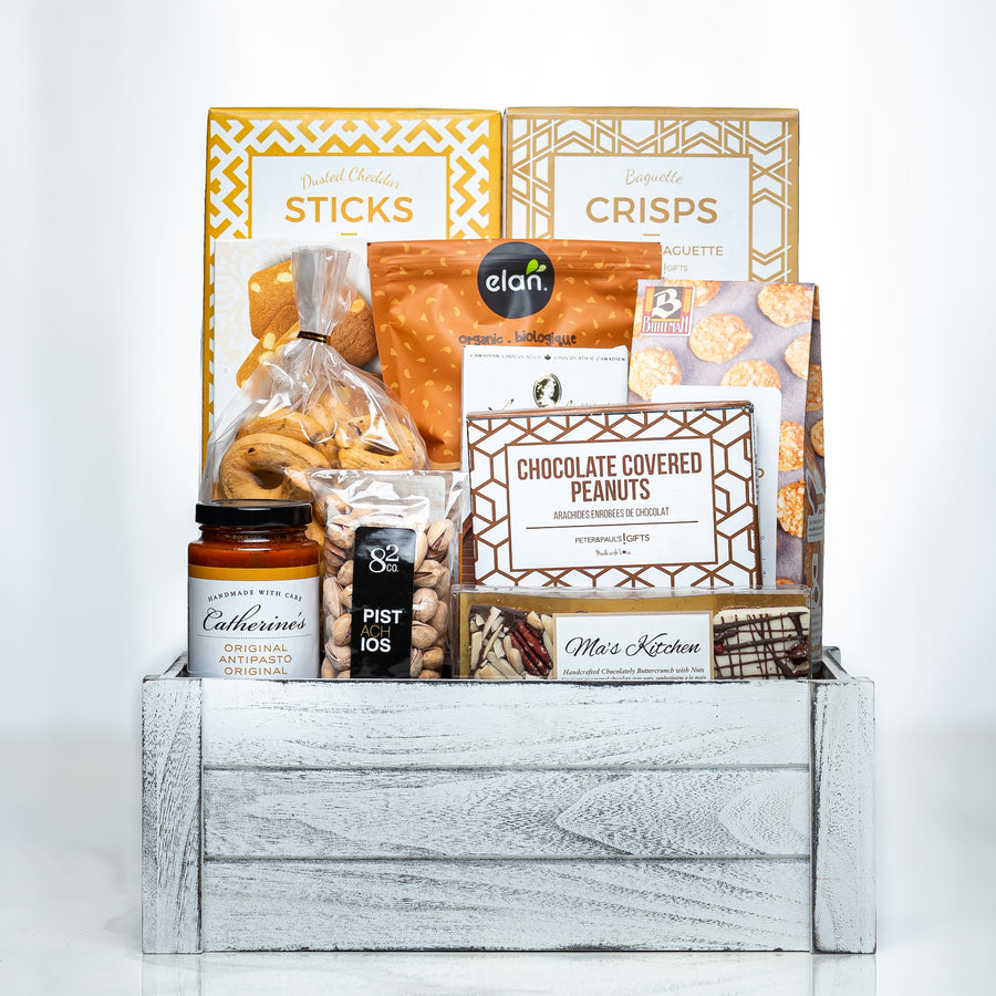 Comfort Collection medium white crate with sticks, crisps, chocolate covered peanuts and preserves