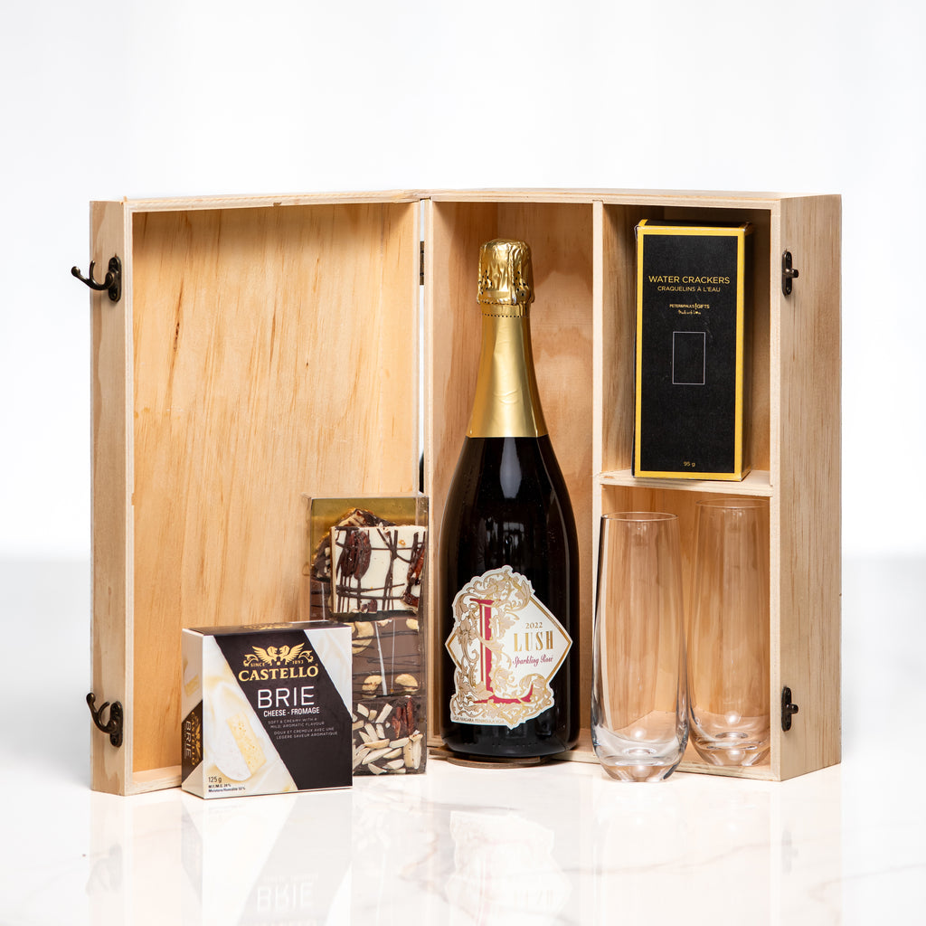 Congratulations deluxe gift, a bottle of champagne with glasses and brie in a hinged wooden box