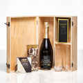 Congratulations gift, a bottle of sparkling wine and two glasses in a hinged wooden presentation box