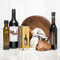 Cucina Collection Italian gift with olive oil, vinegar, a round serving board, salad servers and pasta