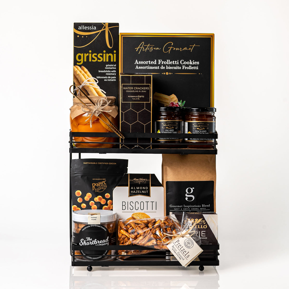 Double Double gift: a black metal two tier stand with Allessia rosemary grissini, Artisan Gourmet frolletti cookies, Martelli jams, peach halves, biscotti, Castello brie, a jar of shortbread and ground coffee