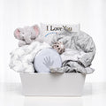 Elephant Embrace baby gift with a grey plush elephant, a blanket, a keepsake box and an I Love You sign