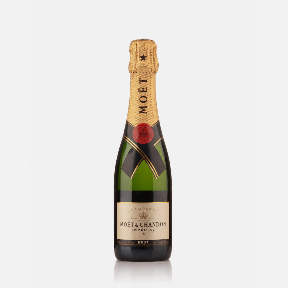 Bottle of Moet and Chandon Imperial champagne in gold foil