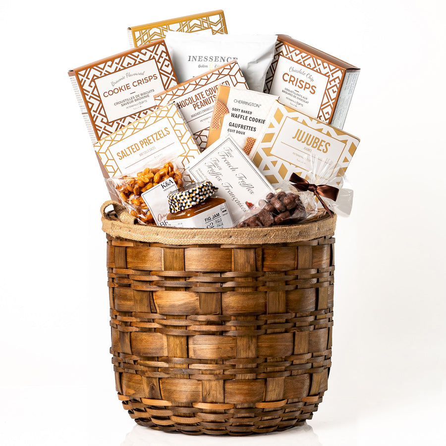 Hearty Hamper Large: a round woven wood chip hamper overflowing with cookie crisps, Inessence truffle crisps, French truffles, jujubes, pretzels and chocolate covered peanuts