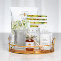 Herbal Harmony gift tray with tea, honey, a glass jar, hand cream and a honey dipper