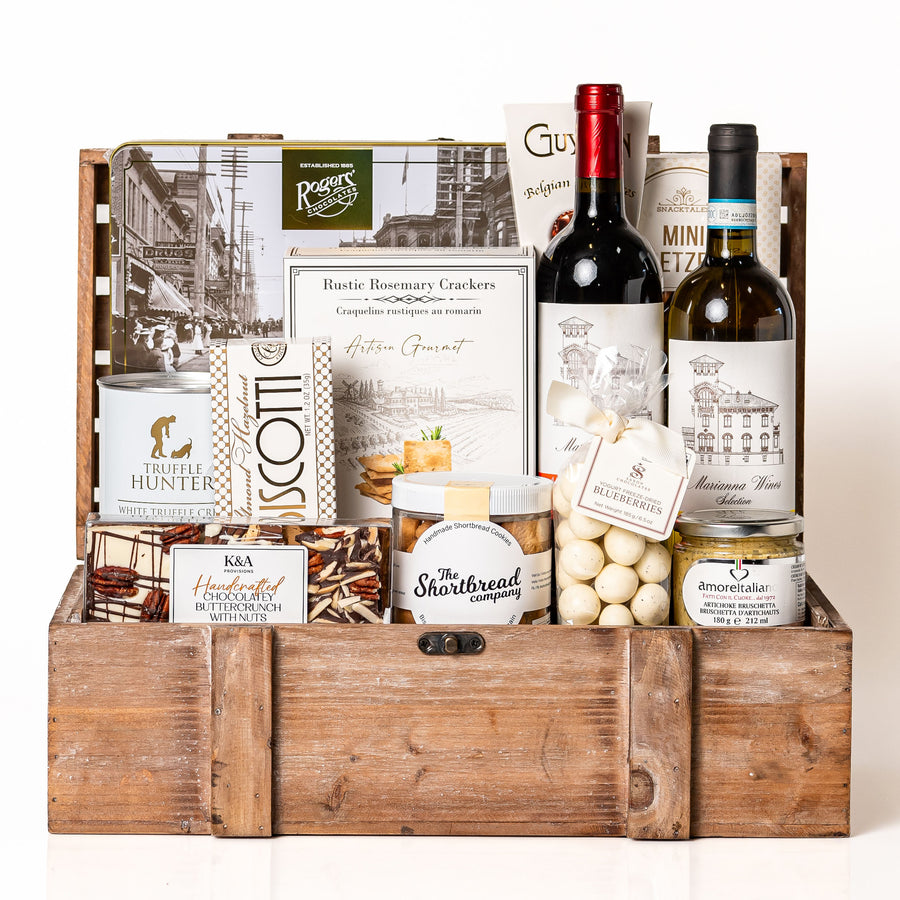 Heritage Large: a wooden crate with a bottle of red and a bottle of white wine, a Rogers Chocolates tin, Guylian chocolates, a truffle crisps tin, crackers, biscotti and shortbread