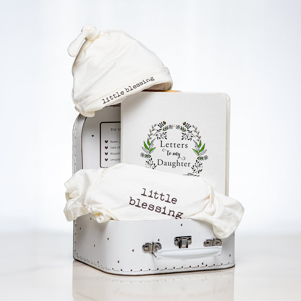 Little Blessing baby girl gift with a white hooded towel and a Letters to My Daughter journal