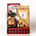 Merry Mixing gift: a red buffalo plaid tray with Harvest Moon Mills gingerbread cookie mix, a holiday spatula set, a jar of cookie cutters and brownie cookie crisps
