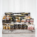 One For All large gourmet gift basket, a tiered wooden crate of chocolates, nuts, cookies and snacks