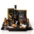 Perfect Pairing: an acacia serving board with a drawer of cheese knives, forks and chalkboard signs, with a bottle of Sensi Chianti, grissini, antipasto, olives, Parmigiano, chorizo and Co. 82 jars