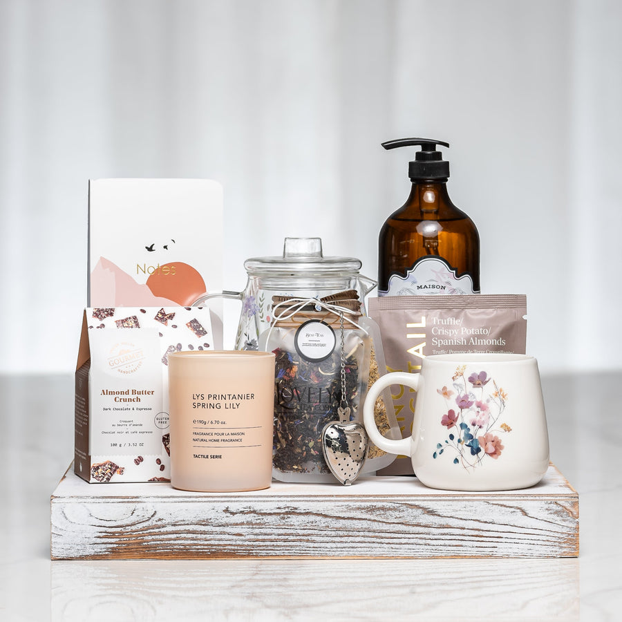 Quiet Comforts gift tray with a candle, hand wash, loose tea in a jar and a patterned mug