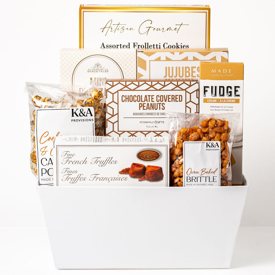Sensational Snacks Medium: a white gift tray with Artisan Gourmet frolletti cookies, jujubes, fudge, chocolate covered peanuts, fine French truffles, caramel popcorn and brittle