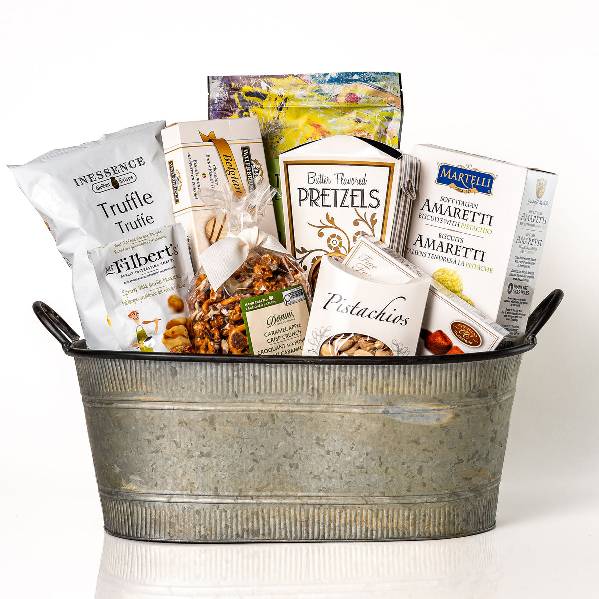 Shareables: a galvanised oval tub with Inessence truffle crisps, butter flavoured pretzels, Martelli pistachio amaretti, pistachios, Mr Filbert's mixed nuts and fine French truffles