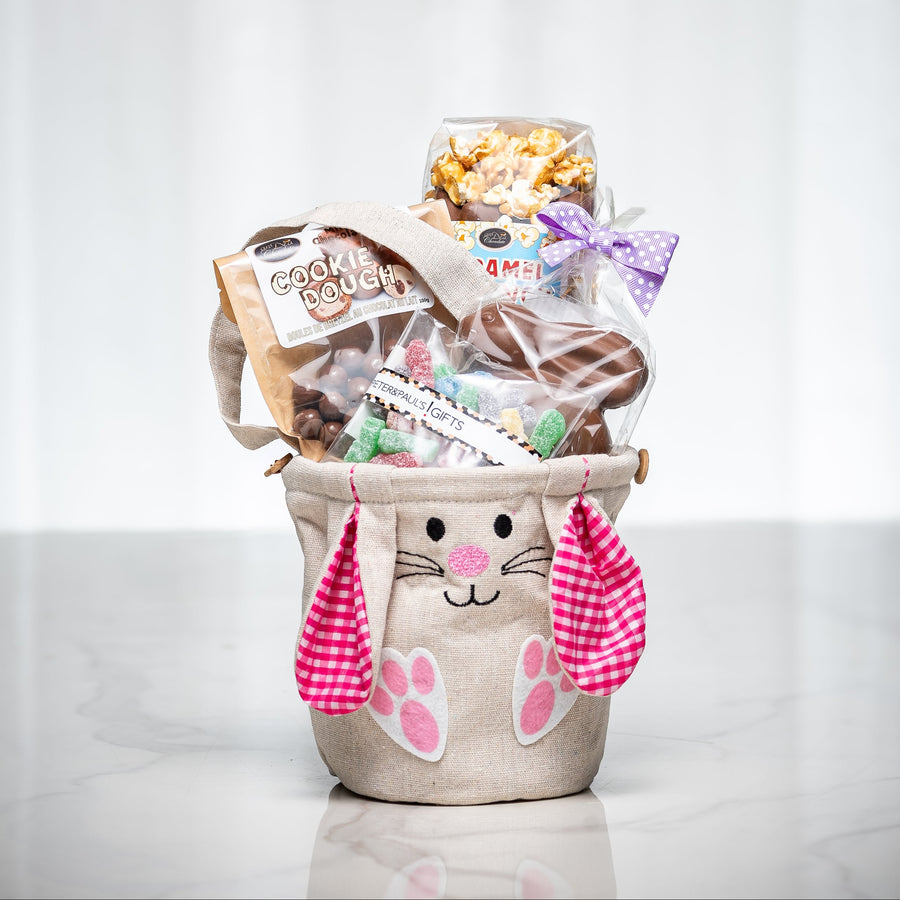 Some Bunny Loves You girl's gift in a bunny ear sack with popcorn, chocolates and treats
