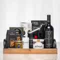 The Entertainer gift tray with a bottle of red wine, pretzels, nuts, cheese and candles