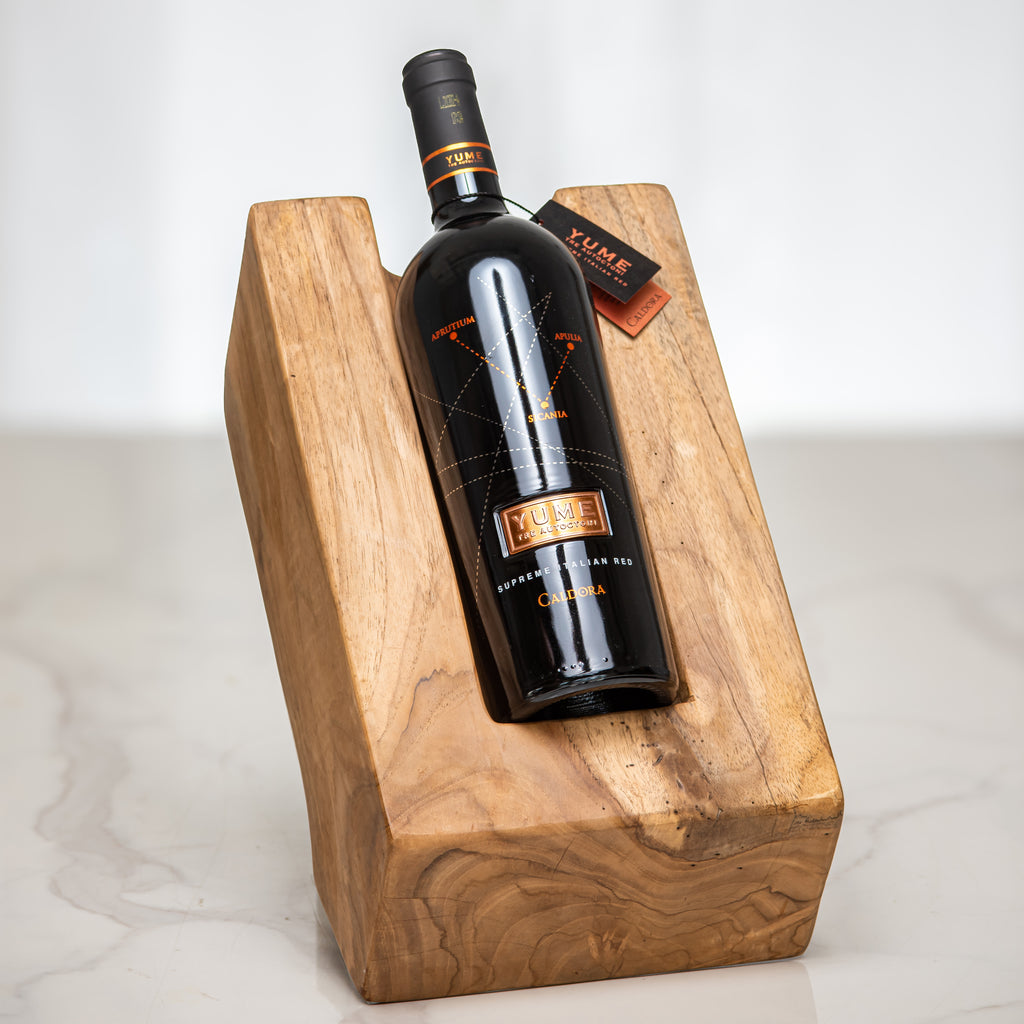 The Wine Block, a bottle of red wine presented in a solid wood block holder