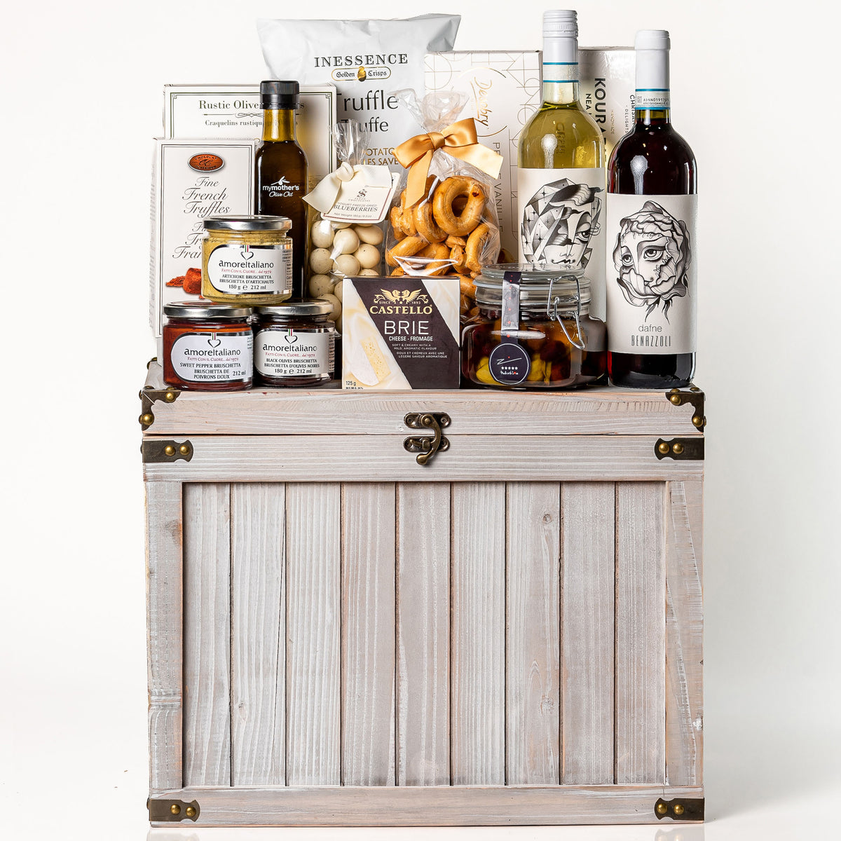 Ultimate Indulgence Large: a grey cedar wood chest with an X design holding a bottle of rosé and a bottle of Pinot Grigio, My Mother's olive oil and olives, Amore bruschetta, Castello brie and truffle crisps