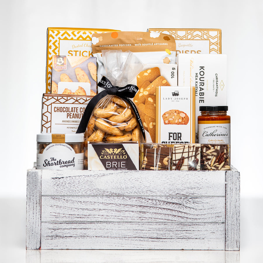 Comfort Collection large white crate with sticks, pretzels, brie, chocolate covered peanuts and preserves