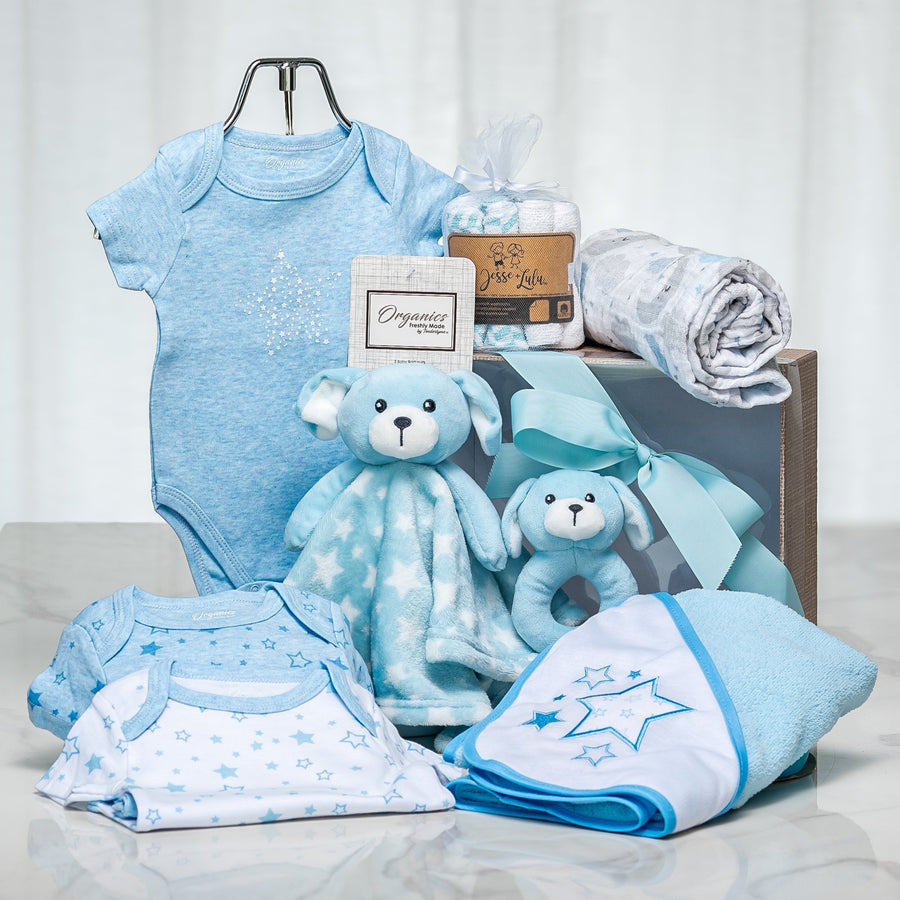 Little Star baby boy gift with blue onesies, a blanket and plush bear and bunny in a wooden crate