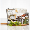 Round the Table gift board with pretzels, biscotti, preserves, chocolates and a wooden spoon