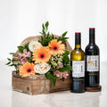 Twice as Nice small gift with two bottles of wine and a gerbera and rose arrangement in a wooden crate