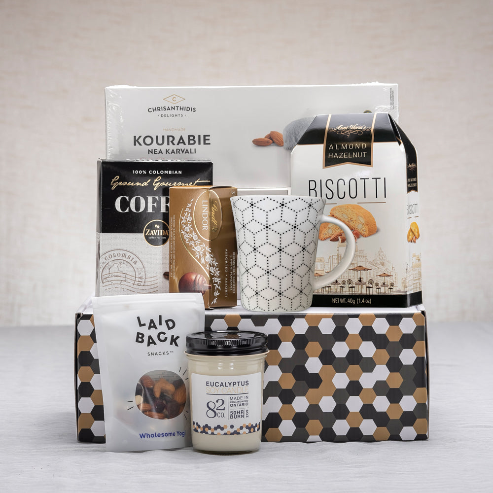 Gift Box with gourmet chocolate, snacks, a ceramic mug, and scented candle