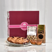 Load image into Gallery viewer, Pink striped sweetie pie box with large pie, mini butter tarts, double chocolate shortbread in brown bag, and birthday cake caramel corn
